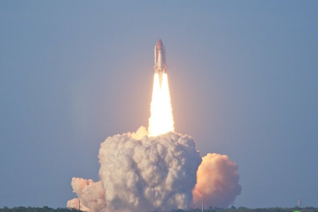STS-133 Discovery liftoff from Launch Pad 39A