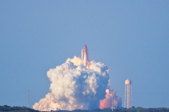 STS-133 Discovery liftoff from Launch Pad 39A