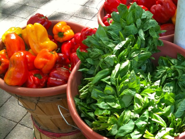 Basil, peaches, raspberries, tomatoes, cookies, nuts, you name it; all kinds of delicious food at the Portland Farmers Market.