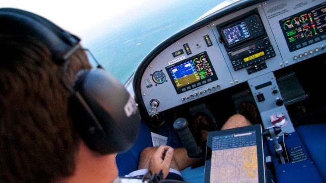 An over-the-back look at the glass cockpit inside the SportCruiser (N601CF)